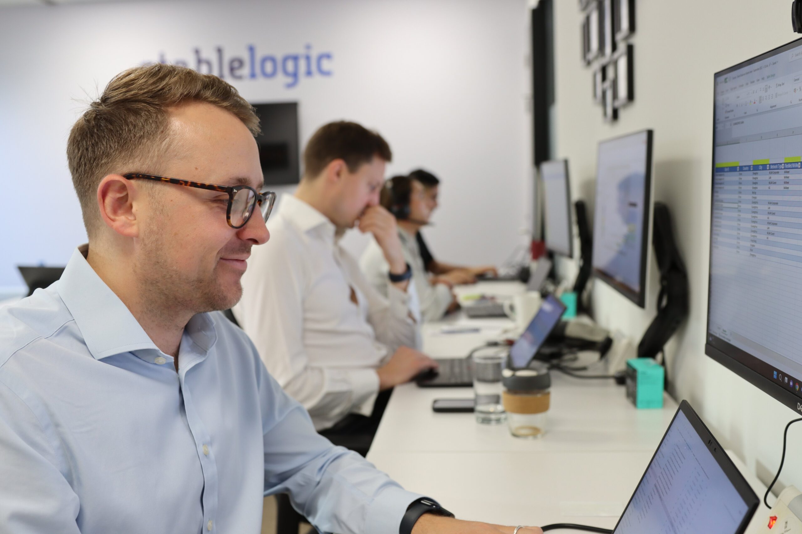 StableLogic team working in the office